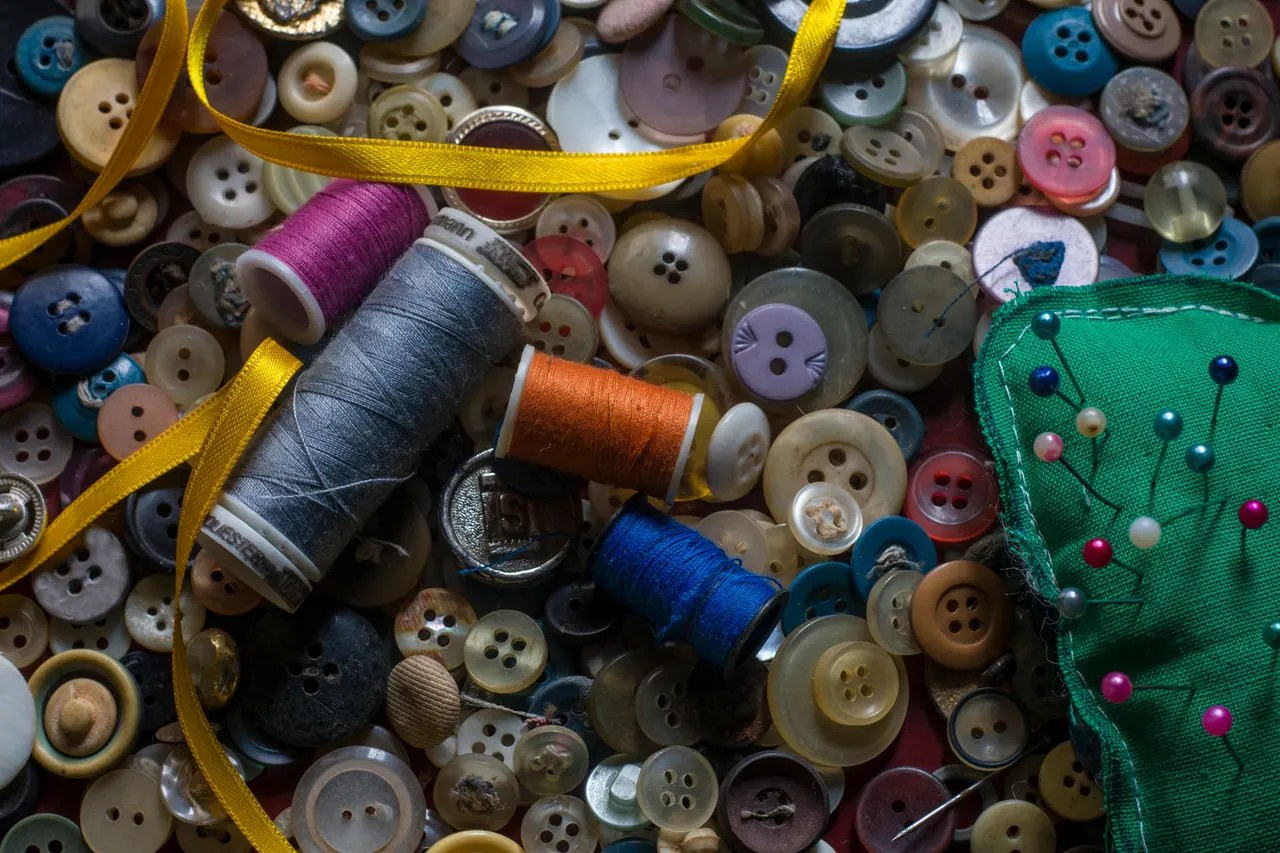 Fabric, thread and project materials arranged for kit planning